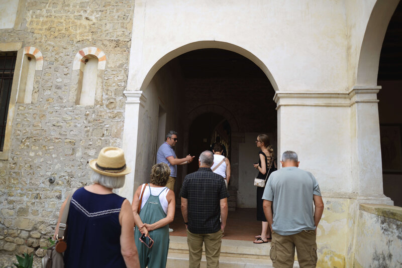 A small group of people taking a tour On the Italian on Tour’s 10 day Northern Italian Delights Food & Wine Tour